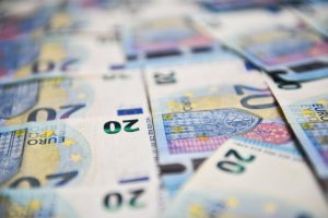 European money in banknotes of twenty euros. Selective focus.