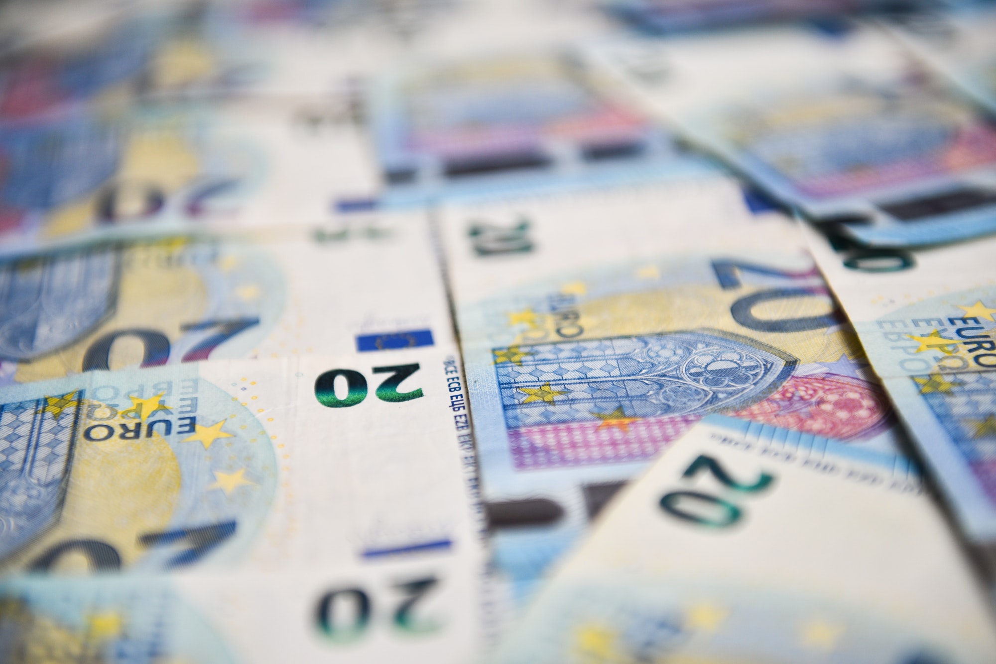 European money in banknotes of twenty euros. Selective focus.