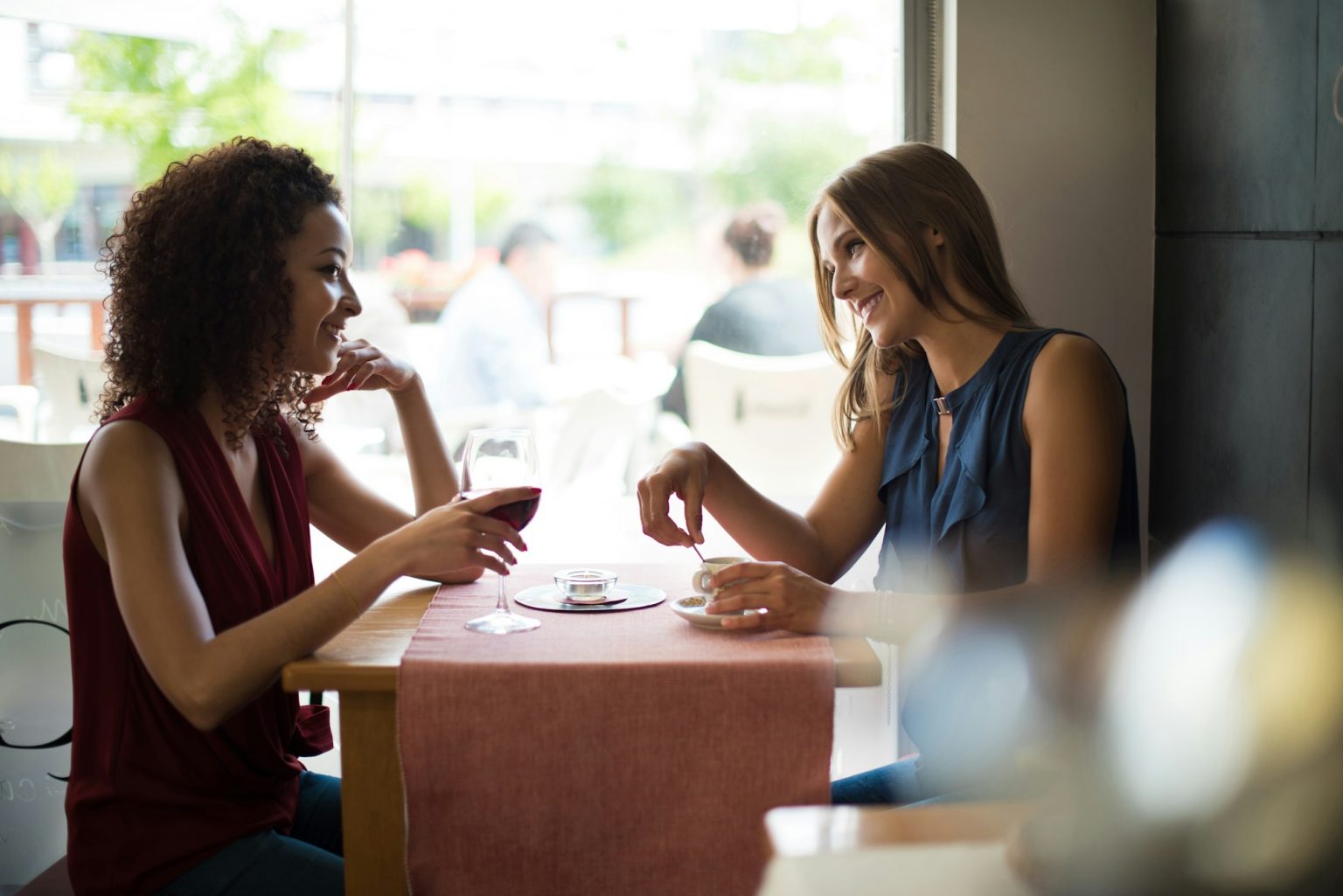 Woman at coffe shop table