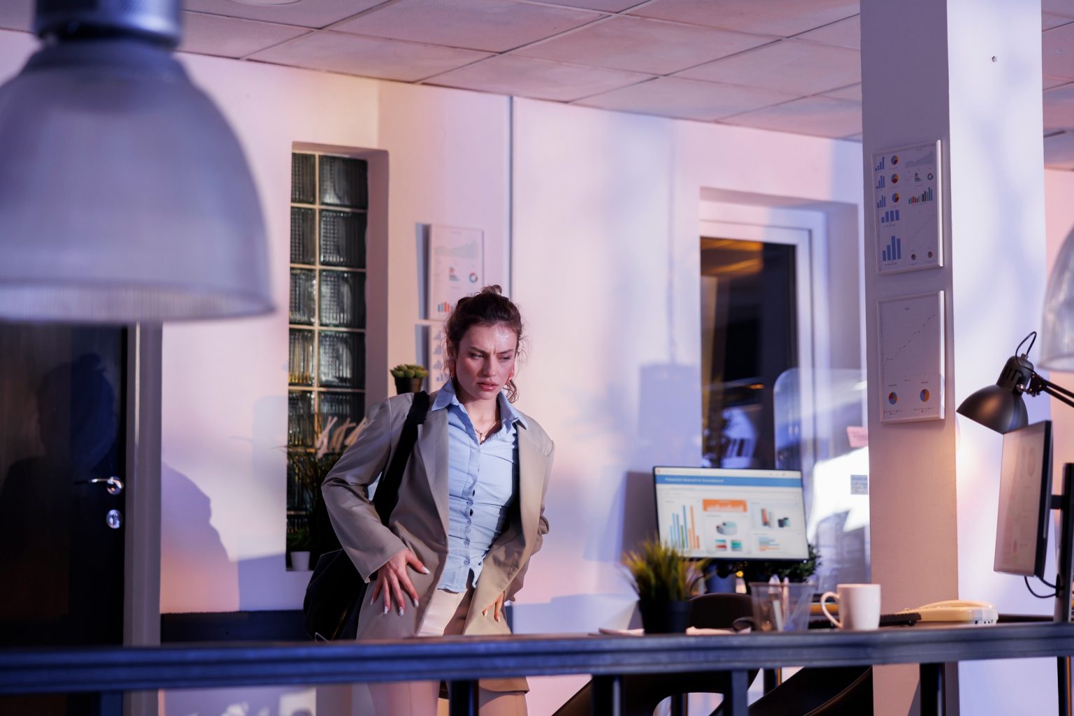 Caucasian worker leaving startup office late at night